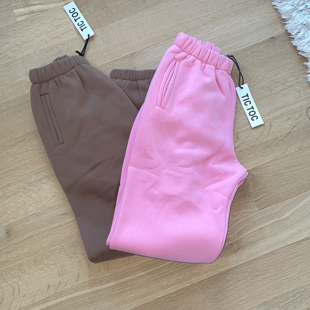 2 pairs of new  sweats